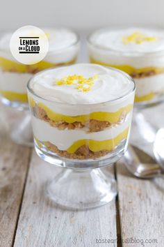 three desserts in small glass dishes on a wooden table