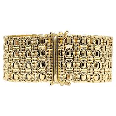 Add a touch of sophistication and style to your jewelry collection with this stunning Milor Italy polished gold bracelet. Crafted from high-quality 14-karat yellow gold, this bracelet features a wide and unique link band design that sets it apart from ordinary accessories. This bracelet beautifully adorns your wrist with its eye-catching presence, measuring approximately 7 inches in length and 1 inch in width. The sleek and slender depth of roughly 2mm ensures a comfortable fit while maintaining Band Design, Yellow Gold Bracelet, Timeless Accessories, Layered Look, Easy Wear, Link Bracelets, Unique Pieces, Metallica, Diamond Earrings