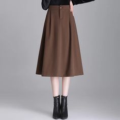 • High Waist Design :The high waist design of this brown wool skirt accentuates the waistline, creating a flattering silhouette for any body type. • Loose A-line Cut :The loose A-line cut offers a comfortable fit while adding a touch of elegance to your outfit. Perfect for commuting or casual outings. • 2023 Autumn and Winter Collection :Part of our 2023 Autumn and Winter collection, this skirt is designed to keep you warm and stylish in the colder months. • Mainland China Origin :Originating from Mainland China, this skirt reflects the countrys rich textile heritage, ensuring high-quality craftsmanship. • Elegant Commuting Hip :This skirts elegant commuting hip style makes it a versatile addition to any wardrobe, suitable for both work and leisure activities. • Small Size :Its small size Fall Outfits Elegant, Skirts Elegant, Couples Halloween Outfits, Hip Style, Elegant Skirt, Leisure Activities, Wool Skirt, Couple Halloween, 2023 Autumn