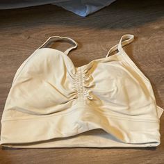 Never Worn. With Tags. Nulu Front Gather Yoga Bra Lululemon Bras, Cream Yellow, Yoga Bra, Women's Intimates, Lululemon Athletica, Yoga, Bra, Cream, Tags