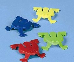 four different colored plastic toy animals on a blue surface with one red, one green and one blue