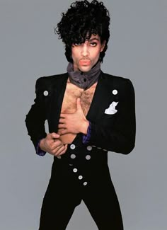 an image of a man with curly hair and no shirt on posing for the cover of prince magazine