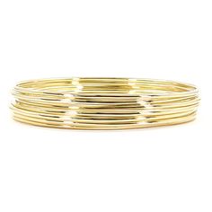 14 Karat yellow gold solid rounded seminario bangle with 2.5 inch interior diameter. Finished weight is 5.6 Grams. Gold Tarnish-resistant Round Bangle, Tarnish Resistant Gold Round Bangle, Stackable 14k Gold Round Bracelet, Gold Hoop Bracelet With Polished Finish, Gold Stackable Bangle, Gold Stackable Round Bangle, Gold Hoop Bangle With Polished Finish, Gold Bangle With Shiny Finish In 14k, 14k Gold Hoop Bangle