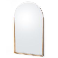 an arched mirror on a white wall