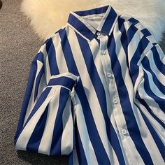 Blue white striped shirt women's spring autumn loose retro classical blouse niche designer long-sleeved shirts men elegant wear aidase-shop Mens Vest Casual, Blue And White Striped Shirt, Men's Trench Coat, Striped Shirt Women, Elegant Wear, Men's Windbreaker, White Stripes Shirt, Trendy Mens Fashion, Mens Spring Fashion