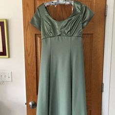 Never Worn Gown In Light Green With Satin Top And Florets In Back. Back Zipper. Capped Sleeves. 100% Polyester. Green Fitted Short Sleeve Gown, Green Fitted Gown With Short Sleeves, Fitted Short Sleeve Bridesmaid Gown, Jordan Dress, Jordan Green, Womens Jordans, Capped Sleeves, Satin Top, Back Back