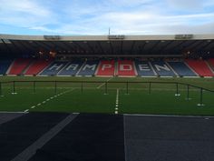 an empty soccer field with the words hampden written on it's side