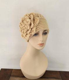 Crochet women's hat with large flower.  Flower is about 7". It's simple yet chic and comfortable.  I make the hats fits to average adult head 22" but if you need different size please leave a note at the check out what size you want.  The color in the picture is dark cream.  If you want flower 2 different colors you can leave a note at the check out what colors. Always smoke, pet free environment. Accessories Crochet, Crochet Woman, Winter Hats For Women, Daytona Beach, Crochet Beanie, Large Flowers, Winter Hat, Hats For Women, Women's Accessories