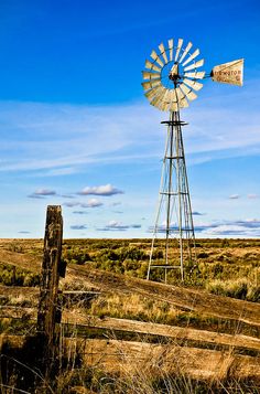 an old windmill in the middle of nowhere