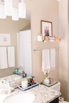 the bathroom is clean and ready to be used as a makeup room or guest suite