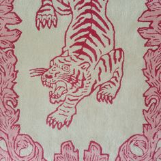 a red and white rug with a tiger on it