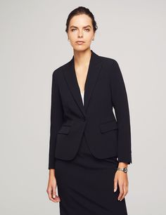 Our Executive Collection was created with the ambitious professional in mind to provide class and convenience for the woman who does it all. This 2-piece suit is the start of your staple wardrobe. Pair with your favorite Anne Klein blouse to finish the look. Jacket Notched collar, single button closure at front, shoulder pads Flap pockets at front and lapel pocket at left chest Hits at Hips, approx: 22.5" in length Lined Skirt Approx. 20" in length Back zipper with hook-and-eye closure On-seam p Professional Collared Skirt Suit For Work, Tailored Professional Skirt Suit For Business Casual, Professional Tailored Skirt Suit For Business Casual, Professional Skirt Suit For Workwear, Tailored Professional Skirt Suit For Career, Tailored Skirt Suit For Career, Single Button Skirt Suit With Suit Collar For Office, Tailored Professional Skirt Suit For Office, Notch Lapel Skirt Suit For Business Casual