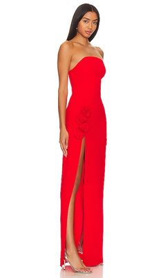 Find AMANDA UPRICHARD X Wolfe Gown In Red on Editorialist. Amanda Uprichard X REVOLVE Wolfe Gown in Red. - size L (also in M, S, XL, XS) Amanda Uprichard X REVOLVE Wolfe Gown in Red. - size L (also in M, S, XL, XS) Say hello to the Wolfe Gown from Amanda Uprichard X REVOLVE. It's not just another red dress - it's THE red dress. Dive into its dreamy crimson shade that gives classic elegance a fresh twist. The boned bodice- It's all about making you feel and look your best. And let's talk about th Revolve Long Dresses, Revolve Prom Dresses, Sunset Prom Dress, Formal Dresses Long Elegant Classy, High Neck Satin Dress, Revolve Prom, Red Strapless Prom Dress, Formal Dresses Long Elegant, Long Dress Formal