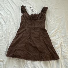 Urban Outfitters Blair Eyelet Mini Dress Size Small Condition: Nwt Color: Brown Details : - Light And Airy Uo Mini Dress In An Allover Eyelet. - Femme Silhouette With Ruffle Trim And A Cutout At The Empire Bust. - Wide Square Neckline - Cutout Tie At The Empire Bust - Smocking At The Back - Ruffle Trim - Body-Skimming Fit - Mini Length Extra: - I Ship Between 1-2 Days Casual Ruffled Mini Dress By Urban Outfitters, Lined Mini Dress From Urban Outfitters, Casual Lined Mini Dress By Urban Outfitters, Urban Outfitters Casual Ruffled Mini Dress, Urban Outfitters Mini Dress With Ruffles, Urban Outfitters Lined Mini Dress, Urban Outfitters Casual Mini Dress With Ruffles, Spring Brown Mini Dress From Urban Outfitters, Urban Outfitters Brown Summer Dress