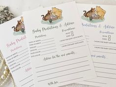 three baby shower game cards with winnie the pooh on them and pearls around it