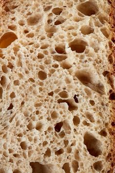 a close up view of a piece of bread with holes in the top and bottom