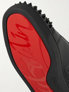 The 'Louis Junior' low-tops are a core design in Christian Louboutin's sneaker collection, and this 'Spikes' version perfectly melds the label's classic appeal and rock 'n' roll flare. They're made from smooth black leather, fitted with sleek tonal eyelets and laces, and finished with conical hardware on the toecaps. Wear them with slim, dark jeans. Luxury Custom Black Sneakers With Red Sole, Saint Laurent Leather Jacket, Louboutin Collection, Christian Louboutin Sneakers, Core Design, Saint Laurent Jeans, Sneakers For Men, Dark Jeans, Lace Fashion