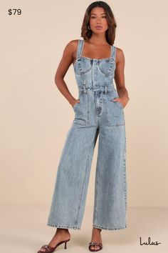 From street style to weekend style, we can't get enough of the Lulus Confirmed Trendsetter Light Wash Denim Bustier Jumpsuit! Sturdy cotton denim, with a subtle acid-washed effect, shapes this enviably cool jumpsuit that has wide straps (with internal, adjustable back buttons) that support a bustier bodice with seamed cups and a sweetheart neckline. Hidden functional snap button placket secures the front, continuing down to a banded waist with belt loops and a hidden zip fly. Wide pant legs feat Bustier Jumpsuit, Denim Bustier, Jumpsuit Blue, Acid Wash Denim, Weekend Style, Wide Pants, Denim Jumpsuit, Light Wash Denim, Back Patch