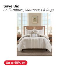 a bed with white comforter and pillows on it in front of a window, the text save big on furniture, mattresses & rugs & rugs up to 65 % off