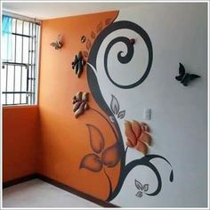 an orange wall with butterflies on it and a window in the background that says fy's