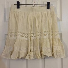 Dainty Beige vintage looking skirt NWT New with tags. Beige color with an under layer. Size medium. Forever 21 Skirts Beige Skort For Spring, Bohemian Short Mini Skirt For Spring, Spring Bohemian Short Mini Skirt, Casual Spring Skirt With Lace Trim, Summer Mini Skirt With Lace Trim, Casual Tiered Mini Skirt With Lace Trim, Summer Mini Skirt With Lace Trim For Day Out, Casual Skirt With Lace Trim For Vacation, Summer Lace Trim Mini Skirt For Day Out