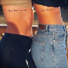 two women with tattoos on their stomachs and the words you have not seen above them