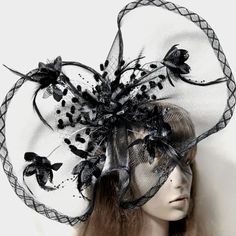 Elegance Meets Sophistication In This Striking Fascinator. With Its Bold Black Hue And Large Size, This Headpiece Exudes A Sense Of Grandeur And Style. Perfect For Tea Parties, Races, Soires, Church Events, Memorials, And Funerals, This Fascinator Is A Versatile Accessory That Adds A Touch Of Glamour To Any Ensemble. Its Intricate Design And Attention To Detail Make It A Truly Gorgeous Piece That Is Sure To Turn Heads And Leave A Lasting Impression. Whether You're Attending A Formal Event Or Loo Satin Long Dress, Fascinator Hair, Bohemian Party, Black Fascinator, Large Feathers, Hat Party, Satin Dress Long, Flower Hat, Wedding Fascinators