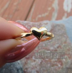 Thanks for the kind words! ★★★★★ "This ring is beautiful and dainty. My daughter loves it." Jessica A. https://etsy.me/3bnkGe8 14k Gold Stackable Rings With Heart Charm For Anniversary, 14k Gold Stackable Rings With Heart Charm, Dainty Heart-shaped Stackable Rings For Anniversary, Dainty Heart-shaped Stackable Anniversary Rings, Dainty Rings With Heart Charm For Anniversary, Dainty Open Heart Ring For Anniversary, 14k Gold Stackable Heart Cut Heart Ring, Yellow Gold Stackable Heart Cut Rings For Promise, Rose Gold Stackable Heart Ring For Valentine's Day