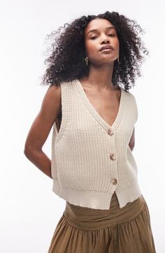 Combine sweater season with a summery day in a shaker-stitch vest knit from a cotton-enriched blend. 19" length (size medium) Front button closure V-neck 64% cotton, 36% nylon Machine wash, dry flat Imported Paris Summer Outfits, What To Wear In Paris, Knitting Tops, Rich Girl Fashion, Vest Knit, Paris Summer, Jacket Ideas, Sweater Season, Free People Style