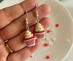 These Red Velvet Cupcake  Earrings are perfect for those who loves  Cupcake!  This is a 100% hand-made realistic fake food miniature. Now you can have your favourite food as a Miniature earrings. "Hello Miniverse" creates uniquely handmade food inspired food Earrings that look as delicious as the real thing.  I make sure packaging is high quality to sustain rough handling by courier service during transit. Dispatch time: Within 15 days.  Delivery time:  Domestic: 5-6 Days International: 20-25 days. Care: Please treat the Cupcake with care. Remove dust with a piece of soft fabric, a brush or a sponge. Protect the product from damages. Do not drop. If you have any question about this listing or anything else, please feel free to contact me. I will get to you as soon as i can! Thanks for view Mini Food Clay, Dessert Earrings, Cupcake House, Cupcake Earrings, Food Clay, Red Velvet Cupcake, Handmade Food, Earrings Food, Kid Cupcakes