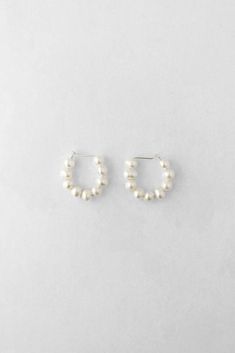 Hoop earrings with creamy freshwater pearls.-Dimensions: Hoop Height: 2.2 cm Hoop Width: 2.5 cm Pearl Width: 5 mm - Materials: Sterling silver findings. Freshwater pearls. Silver Wire, Fresh Water, Freshwater Pearls, Hoop Earrings, Sterling Silver, Silver