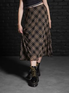 Mix up your plaid skirt rotation with this midi style. It has a mesh overlay printed with black and brown plaid. It's fully lined with an elastic waistband.95% polyester; 5% spandexWash cold; dry lowLength: 29''ImportedListed in junior sizes Houska Castle, Social Collision, Skirts Hot, Plaid Midi Skirt, Corporate Goth, Tall Hoodies, Mini Cute, Plus Size Fits, Mesh Overlay