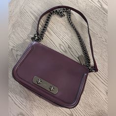 Barely Worn Coach Bag With Tags Still. Purple Clutch Bag For Everyday Use, Elegant Coach Satchel With Branded Hardware, Coach Clutch Satchel For Evening, Rectangular Satchel With Palladium Hardware, Classic Purple Bag For Everyday Use, Classic Purple Bags For Everyday Use, Rectangular Flap Bag With Palladium Hardware, Elegant Flap Bag For Daily Use With Branded Hardware, Elegant Crossbody Bag With Silver-tone Hardware