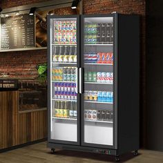 an image of a beverage cooler in the middle of a room with wood floors and brick walls