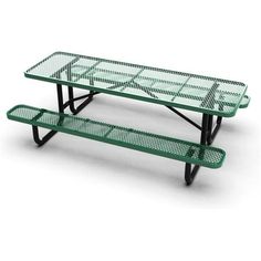 a green table with two benches on it