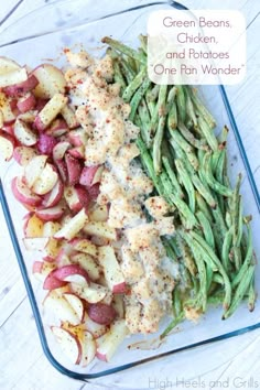 green beans, chicken and potatoes one pan wonder on a glass platter with red onions