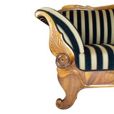 an old fashioned chair with black and white stripes