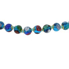 Add a touch of classic Venetian style to your outfit with this elegant Murano millefiori necklace. Centuries-old Murano glass technique perfected by Italian master craftsmen is used to create colorful mosaic effect that is fun and trendy, yet classic and timeless. This is a unique necklace that will add Venetian chic to your jewelry collection and will brighten up your look and your day. Measurements: Each necklace measures 24 inches in length and comes with an attractive velvet pouch and a cert Clear Glass Beaded Necklaces, Clear Glass Round Bead Necklaces, Clear Glass Round Beads Necklaces, Clear Glass Necklace For Jewelry Making, Clear Glass Necklaces With Round Beads, Clear Glass Necklaces For Jewelry Making, Adjustable Glass Necklaces For Formal Occasions, Elegant Round Murano Glass Necklace, Turquoise Single Strand Glass Jewelry