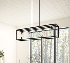 This 5 light rectangular chandelier is unique and perfect decoration for the modern or farmhouse home, minimal lines and modern tones give the light an edge that never disappoints. The corners of its simple cage frame are accented by square blocks, all finished in a deep earth black with clear glass. Perfectly for kitchen island, dining room, living room, cafe, bar, club, warehouse, hallway. Aiwen 5 -Light Black Farmhouse For Use in Bedrooms, Dining Rooms, Foyers, Kitchens, Living Rooms Chandeli Dining Room Black Light Fixtures, Dining Room Light Fixtures Rectangle, Modern Farmhouse Dining Room Chandelier, Townhouse Upgrades, Frame Kitchen Island, Rectangle Light Fixture, Linear Kitchen Island Lighting, Black Farmhouse Chandelier, Linear Kitchen