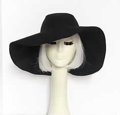 "Wide Brim sun hat made with black linen , lined in rayon print, the hat has a 2 section crown 3 1/2 \" in length and a one piece 5\" brim, a cotton band inside. One size fits most up to 23\" Machine wash cold / hand dry Made in USA Press if needed / packable" Black Wide Brim Sun Hat With Upf 50+, Lightweight Black Bucket Hat With Curved Brim, Wide Brim Sun Hat For Winter Vacation, Black Lightweight Bucket Hat With Curved Brim, Black Curved Brim Hat With Uv Protection, Vacation Wide Brim Sun Hat, Black Bucket Hat With Upf 50+ And Curved Brim, Black Hat With Uv Protection And Curved Brim, Black Flat Brim Hat With Uv Protection