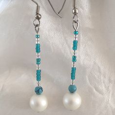 Beaded Turquoise Drop Pearl Hand Crafted Pierced Earrings. Great Gift Idea! Turquoise And Clear Glass Beads Turquoise Round Beads Vintage Costume Off-White Pearl Beads Silver Toned Pierced Earring Hooks Lightweight Fast Shipper Made In Usa Boho Chic Fashion Handmade Jewelry Unique Boutique Essential Shabby Chic Pearlcore Victorian Regencycore Accessory Turquoise Silver Beaded Dangle Earrings, Diy Earrings Easy Beads, Turquoise Earrings With Silver Round Beads, Elegant Turquoise Beaded Dangling Earrings, Turquoise Beaded Earrings With Silver Beads As Gift, Elegant Turquoise Beaded Earrings Nickel-free, Elegant Turquoise Beaded Earrings Nickel Free, Simple Bead Earrings, Turquoise Bead Earrings