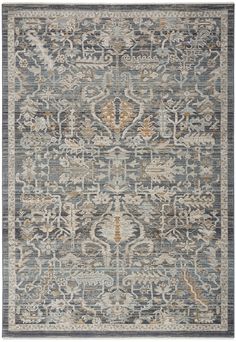 an area rug with grey, yellow and blue colors on the bottom half of it