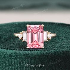 3CT Emerald Cut Pink Sapphire Engagement Ring Solid Gold Lab Pink Sapphire Wedding Ring Vintage RIng Promise Ring Cluster Baguette Ring * Order Service: Engraving/Rush Order/ Shipping Upgrade/ Size Upgrade/ 18K or Platinum upgrade https://www.etsy.com/listing/889751602/ Jewelry Details:  * Center Stone: Lab pink sapphire, Emerald cut  * Measures: 7x10mm * Accents Stones: Colorless Moissanite or Natural Diamonds  * about 0.431carats * Natural Diamond: * Color & Clarity: H, SI * Metal Type:  Solid 14k yellow gold, rose gold, white gold (Platinum, 10K or 18K metal upgrade, upon request) * Eco Friendly and Sustainable & All diamonds are conflict-free.  *Processing and Shipping: Please allow 2-3 weeks for the fabrication of this ring. (Made in US*) Once the ring ships out, the delivery time for Unique Engagement Rings Pink, Emerald Cut Ring Gold, Sapphire Emerald Cut Ring, Sapphire Wedding Ring Vintage, Pink Sapphire Wedding Ring, Wedding Rings Pink Sapphire, Pink Sapphire Engagement Ring, Pink Engagement, Pink Sapphire Engagement