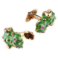 The frog cufflinks are beautifully rendered in Guilloche enamel in vibrant shamrock green color layered over 18K patterned gold and inset with exquisite rubies (set upside-down for a dramatic effect). Guilloche (Basse Taille) vibrant green enamel Natural rubies total weight 0.30 carats 41.50 grams 18K yellow gold Leon Mege, Vintage Cufflinks, Silver Cufflinks, Green Enamel, Gold Enamel, The Frog, Stone Cuts, Vibrant Green, Natural Ruby