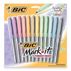 four markers with different colors on them in the package, including pink, blue, green and