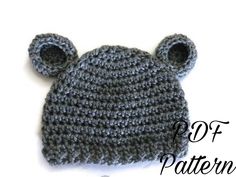 a crocheted hat with ears is shown