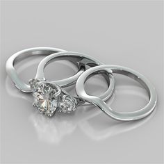 three wedding rings with a diamond in the middle on a gray background, 3d illustration