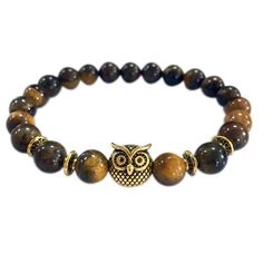 CREATURES OF THE NIGHT give us chills and fun at the same time. We have added Owl Bracelet to complete our collection. An Owl Bracelet you can carry everywhere you go, while at the same time you display your support and love for this unique animal. This is perfect for you, or as a gift for a loved one. Limited stock, get yours before they're gone Product details: Material: Elastic Beaded Bracelet, Alloy, Acrylic, Ceramic, Stone Help us raise awareness of the threats animals face. With every Neck Stone Bead Bracelets, Textured Bracelet, Owl Bracelet, Lava Stone Bracelet, Lava Bracelet, Buddha Head, Bracelets Gold Diamond, Pretty Bracelets, Bead Bracelets