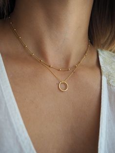 Karma circle pendant and Satellite chain jewellery, Set of two gold necklaces, Gold plated sterling silver 925 necklace, necklace, Everyday Necklace, Layering Necklace, Delicate Necklace, -Karma charm diameter measures about 1 cm This is a set of two gorgeous individual necklaces that looks great alone or layered together -First necklace is a satellite choker chain which mach perfect with all your necklaces as it is a basic piece for all of layered look. It is available in three length's -Second Gold Necklaces With Delicate Open Circle Chain, Dainty Double Chain Round Necklace, Dainty Round Necklace With Double Chain, Gold Full Circle Necklace For Gift, Gift Charm Necklaces With Double Chain And Round Pendant, Gift Charm Necklace With Double Chain And Round Pendant, Delicate Circle Clavicle Chain Necklace, Gold Full Circle Jewelry With Delicate Chain, Gold Jewelry With Delicate Full Circle Chain