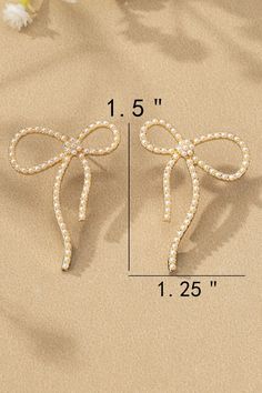 Enhance your outfit with these cute girly Pearl Bow Earrings. The delicate pearl and bow design adds a touch of sophistication to any look. Perfect for any occasion, these earrings are a must-have for any fashion-forward individual. Elegant Gold Earrings With Bow Tie Detail, Chic Butterfly Knot Earrings For Gift, Chic Butterfly Knot Earrings As Gift, Chic Pearl Earrings For Gift, Chic Pearl Earrings As Gift, Formal Bow Drop Pearl Earrings, Formal Pearl Drop Earrings With Bow, Chic Formal Bow Earrings, Chic Bow Earrings For Anniversary